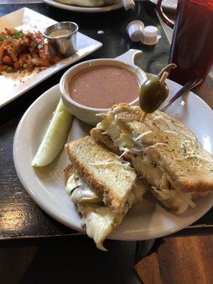 The brie grilled cheese sandwich and they are tomato soup.