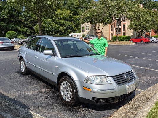 So happy with Michael's work that I asked my wife to take a picture of me with my 21-year-old, 276K-mile car. One happy customer.