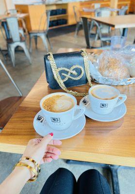 Latte, latte and a sourdough loaf