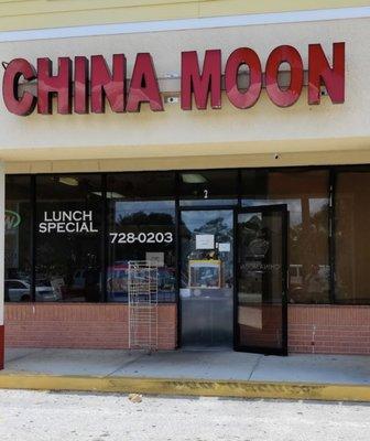 Front of Restaurant showing take out window.