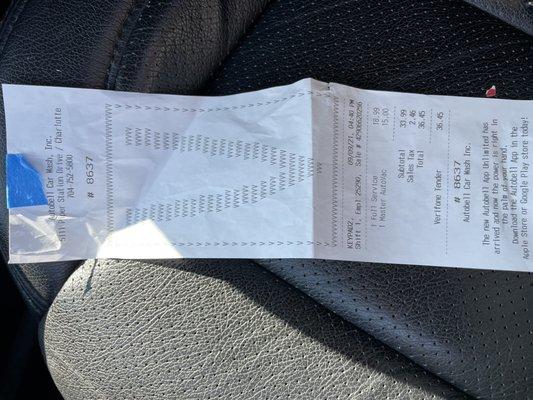 Receipt  showing $36.45 for full service and paid extra $15 for master auto vac