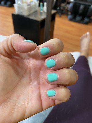 I'm a nail biter and she did the best she could to make my nails look good. I was happy with results