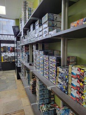 Shelves of Gunpla.