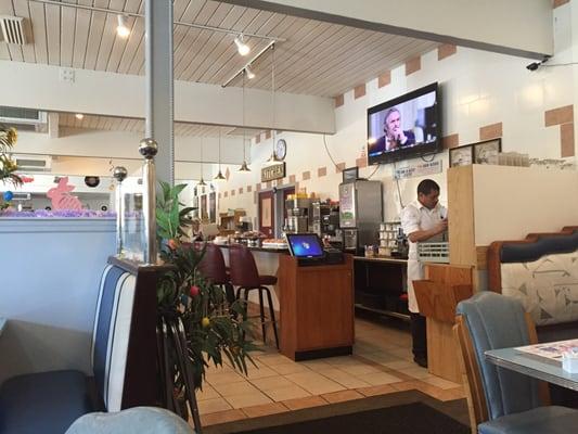 Counter area with TV from far left dining room.