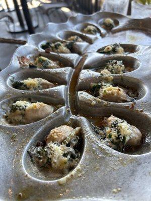 Rockefeller oysters baked with bacon,spinach and parmesan