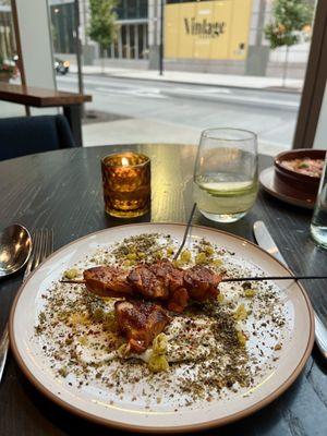 Chicken skewers with lemon yogurt and pistachio