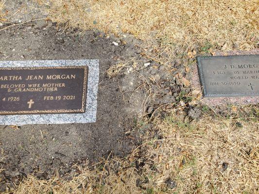 Where the slab should have been placed, covering mom & dad's grave.