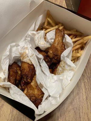 Soy glaze and honey orange wings with fries