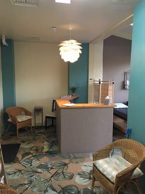 Waiting area and front counter/desk.