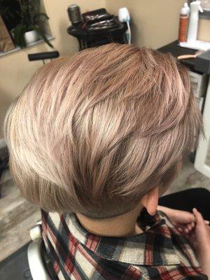 Dusty rose with blonde roots and a fade