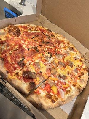 Their famous original half with sausage, peppers and onion.