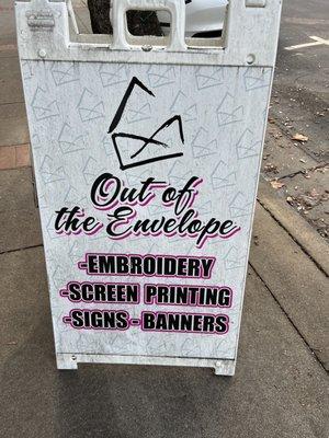 Custom embroidery, screen printing, signs, and banners