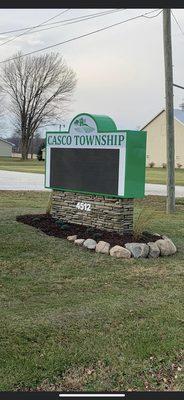 Small Boulders to retain landscape bed around city sign