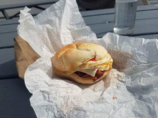 Slamming bacon, eggs and cheese on a roll. $5.50 (2018)