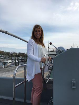 This is one of the owners, Jackie. She transitioned from racing sailboats to captaining these official US Navy Utility Vessels.