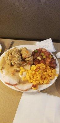 Teriyaki pork chop, carved Turkey, cornbread dressing and mac & cheese