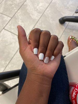 Coffin White Nails with one nail sparkly.