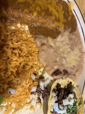 Cheese Enchilada, Taco De Asada, Beans, and Rice.