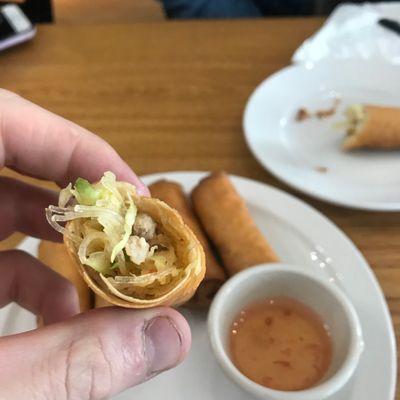 Chicken Egg Roll with cabbage, vermicelli noodles, cabbage, veggies and fish sauce