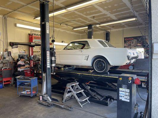 My '66 Mustang being prepped for front end alignment.