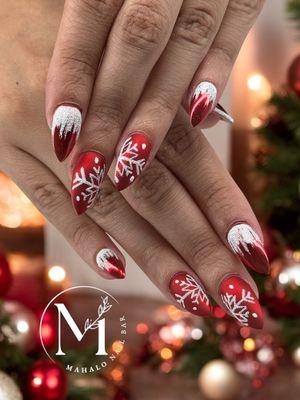 Red chrome nail and snow flake art on Acrylic