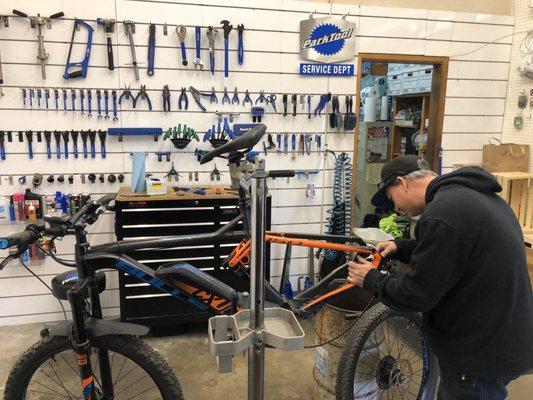 Johnny Moore installing new set of brake pads.