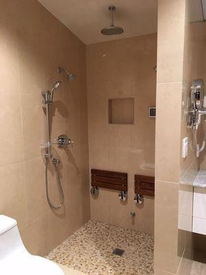 Master shower: wet steam, walls sets, sliding glass door- installed .