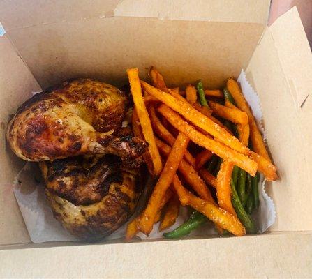 Half of a chicken, sweet potato fries and string beans. The chicken was very good and moist however the sides were just covered in salt.