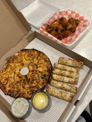 Our fav. The early bird deal + wings! We got the Dixie Two Step Pizza. And the cheese sticks. White sauce and garlic sauce always!