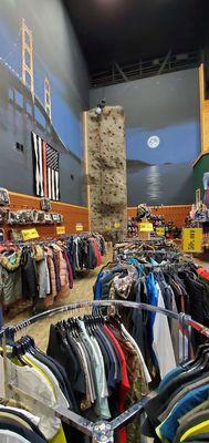 Soo much clothing here.. rock climb wall