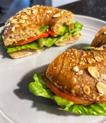 7-Grain bagel with avocado, tomato and lettuce