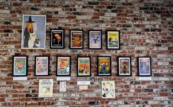 Cool decor of cats in comic books.