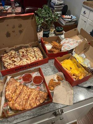 stromboli, pizza, cheese fries, chicken tenders