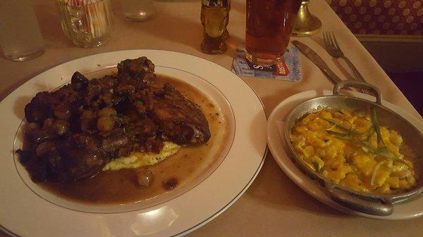 Coq au vin with corn casserole.