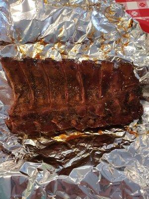 1/2 Rack of RIBS.  Nice smoke ring, tender meat, flavorful, and delicious bbq sauce to top it off! Highly recommend!