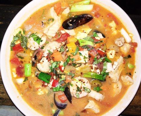 Seafood Tom Yum with calamari, shrimp, mussels and fish of the day. Massive bowl.