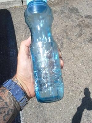 What water looks like in light blue container