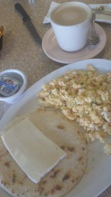 Breakfast all you see eggs the way you liked with arepa (corn cake) cheese and latte or hot chocolat for only $4,99