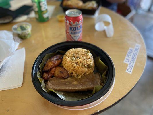 Pasteles combo, comes with arroz con gandules and maduros.