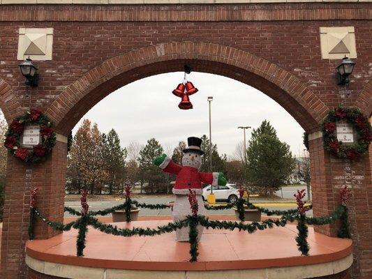 Happy Holidays!  The fountain at our entrance has frozen over and left a fantastic platform for Frosty to greet our patients this holiday!