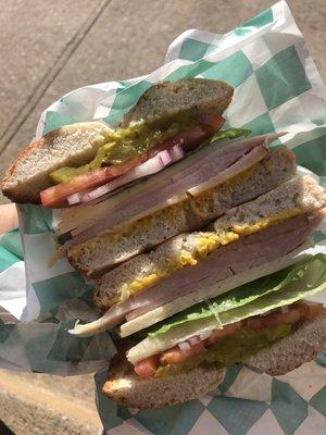 Loaded turkey sandwich on garlic bagel