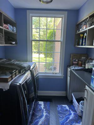 After photo of custom laundry room from floor to ceiling.