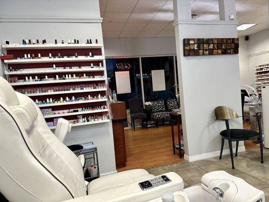 Pedi chairs with nail polish display