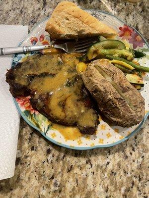 Rib eye, veggies, baked potato & bread