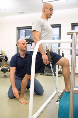 Foot and hip work on vertical balance platform