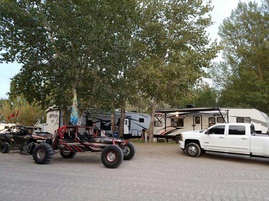 This is supposed to be 3 spots, the sand car and white truck are parked where a 40' fifth wheel was booked.