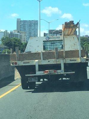 reckless driver on the freeway west bound. Called the company and spoke to Robert, he denies ownership of this company vehicle.