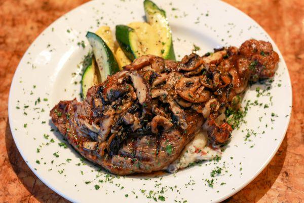 Ribeye with wild mushrooms and black truffle oil