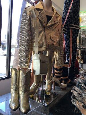 Gold leather motorcycle jacket with rhinestones
Gold snakeskin Larry Mahan cowboy boots