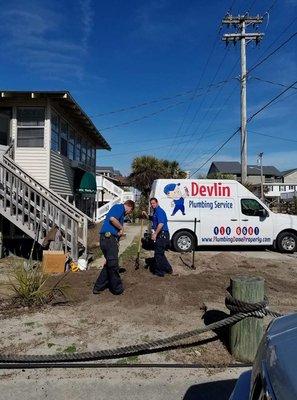 Tony and Preston repairing a water line on a beautiful day at the beach!